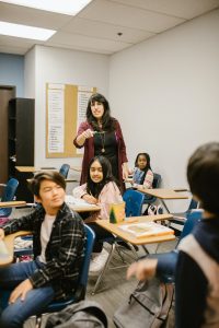 Teacher interacting with class